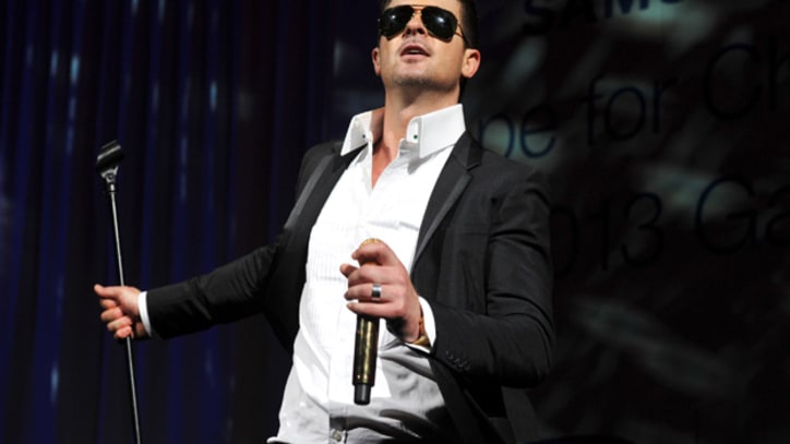 Robin Thicke, Pharrell Sue Over 'Blurred Lines'