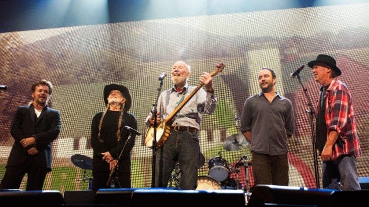 Neil Young, Dave Matthews, Jack Johnson Triumph At Soggy Farm Aid