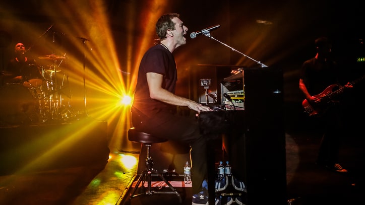 Cold War: Will Coldplay Dethrone 'Frozen' on Charts?