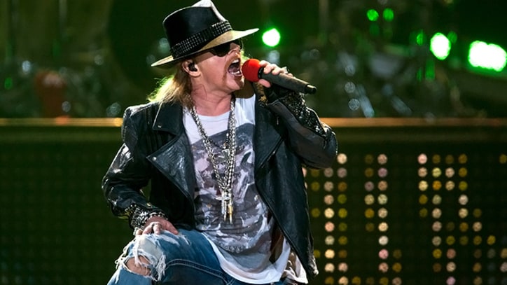 Axl Rose Takes a Tumble Onstage in France