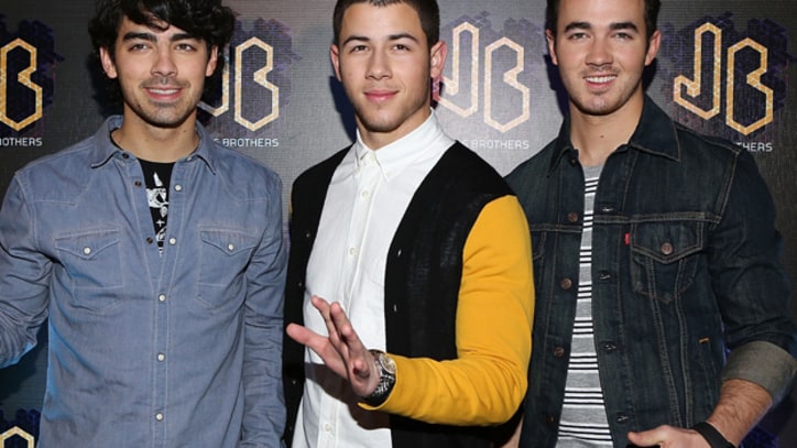 Jonas Brothers Take the Field With 'Pom Poms'
