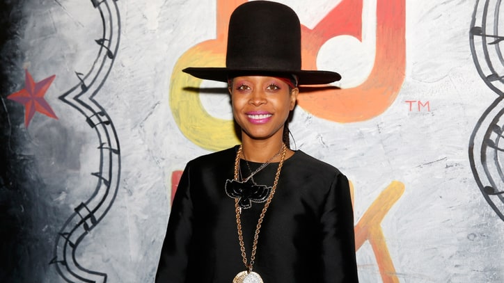 Erykah Badu Tries to Steal a Kiss From Local News Reporter on Live TV