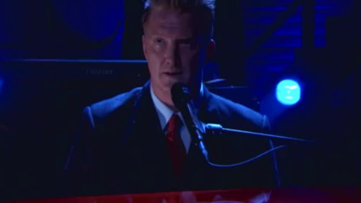 Queens of the Stone Age Get Dapper on 'Conan'