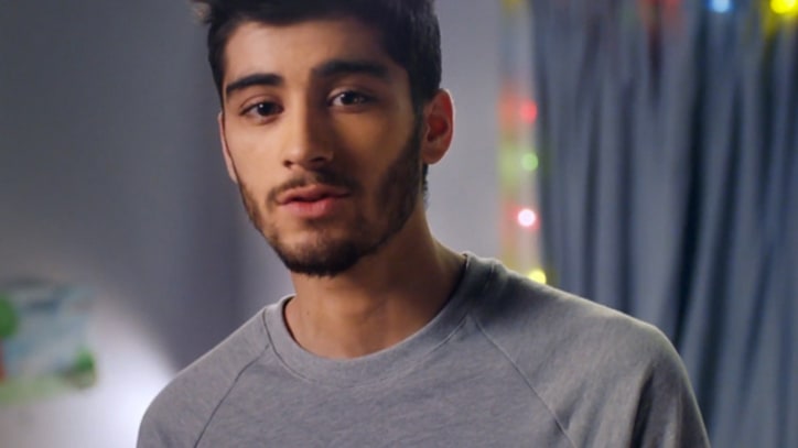 One Direction Pore Over Photos in 'Story of My Life'