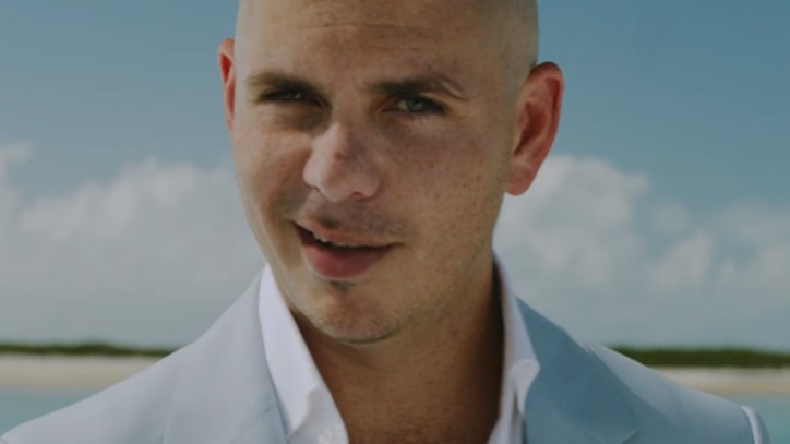 Pitbull and Ke$ha Yell 'Timber' in Surreal New Clip