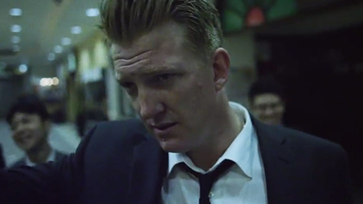 Queens of the Stone Age's 'Smooth Sailing' Clip Captures a Rough Night