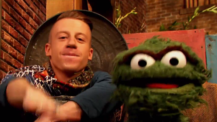 See Macklemore Rap in a Trash Can With Oscar the Grouch