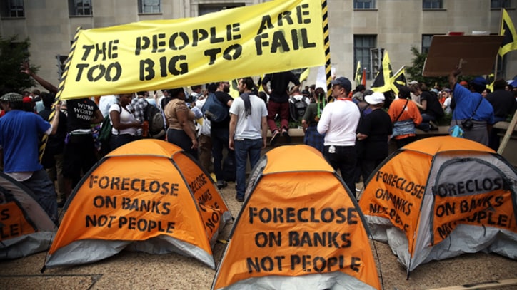 Why Are Homeowners Being Jailed for Demanding Wall Street Prosecutions?