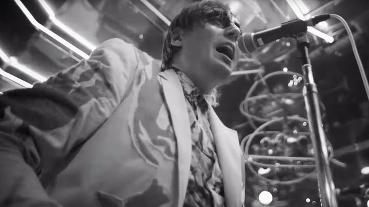 See Arcade Fire Play Unreleased Song, Reflect on Early Days in Clip