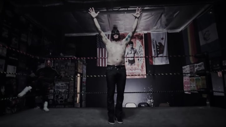 Puscifer, Luchadores Unleash Slingshot Smackdown in 'Money Shot' Video