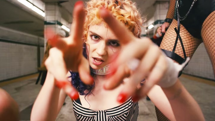 Grimes Enlists Vampiric Cyberpunks for 'Kill V. Maim' Video
