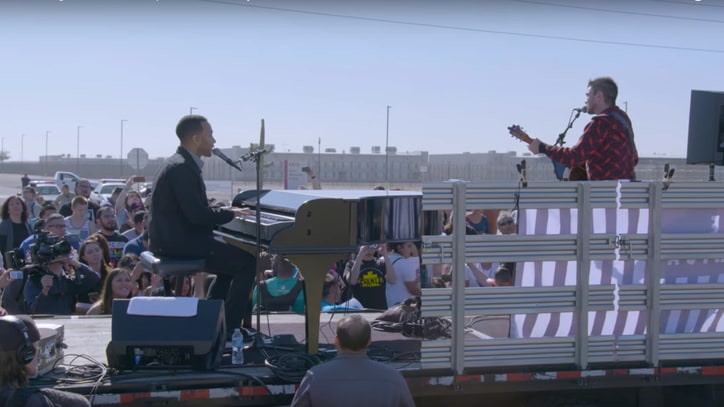 Watch John Legend, Juanes Play 'Redemption Song' Outside Detention Center