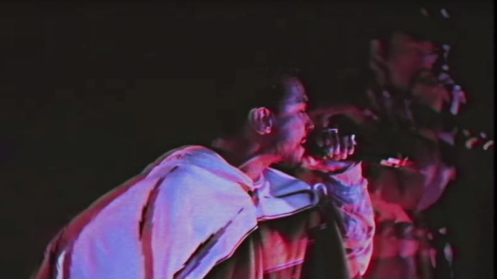 See Miguel, Travis Scott Sing From the Rooftops in 'Waves' Remix Video