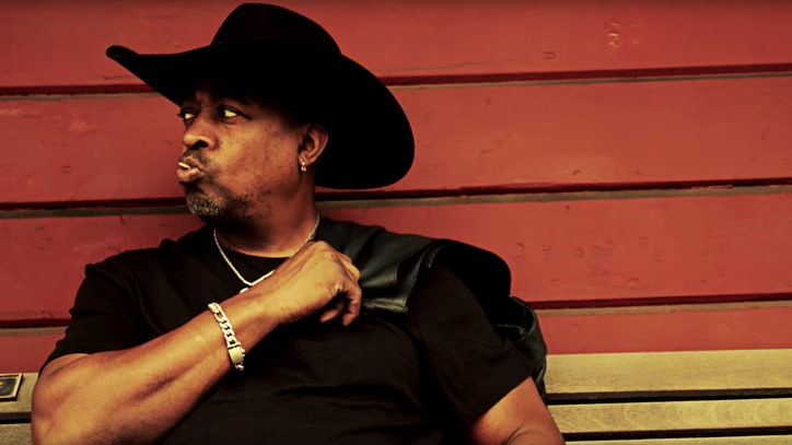 Chuck D Goes Cowboy for Public Enemy's 'Honky Tonk Rules' Video