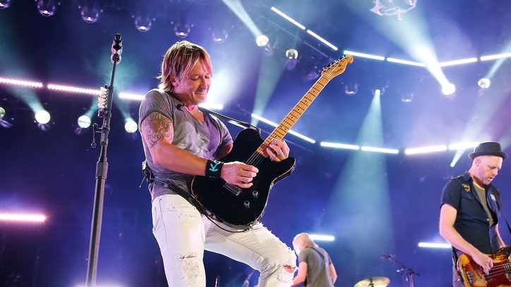 Watch Keith Urban Pluck Front-Row Fan for Guitar Jam