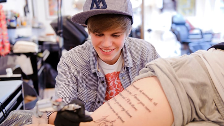 Fans' Bad and Bad-Ass Rock Tattoos