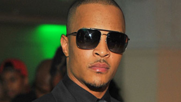 T.I. Back in Federal Custody After Taking Luxury Bus to Halfway House