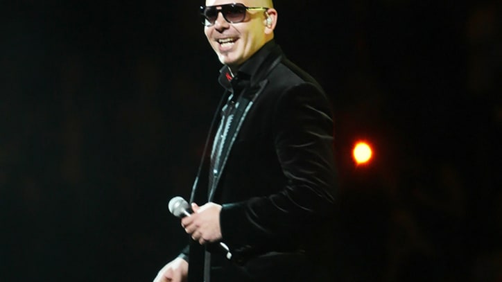 Pitbull Files Countersuit Against Lindsay Lohan