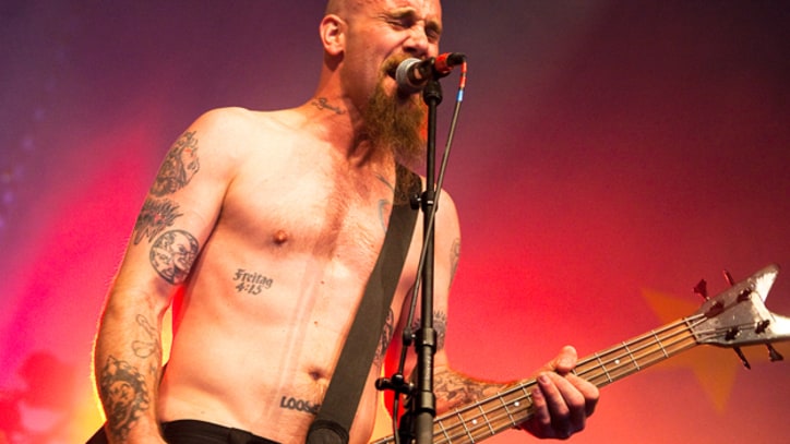 Former Queens of the Stone Age Bassist Reunites With Band on New Album