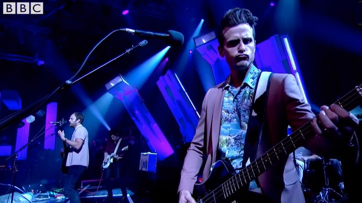 Watch Kings of Leon Debut New Pop-Rock Song 'Around the World'