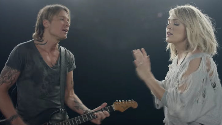 See Keith Urban, Carrie Underwood's Kinetic 'The Fighter' Video