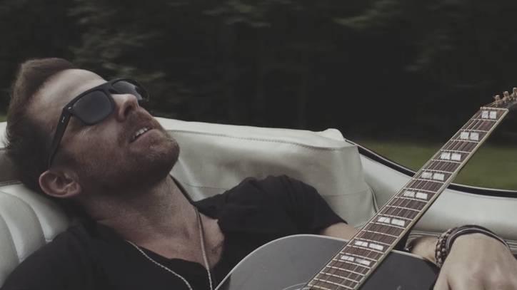 Watch Kip Moore Hitch a Ride in Easygoing 'Bittersweet Company' Video