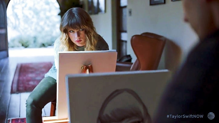 Taylor Swift Spars With Andy Samberg, Steals Cookie Dough in Promotional Video