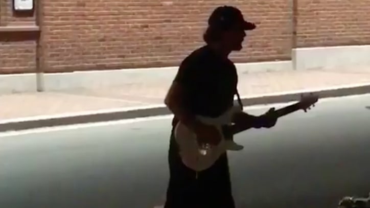 See Eddie Vedder Busk Outside Wrigley Field After Cubs Game