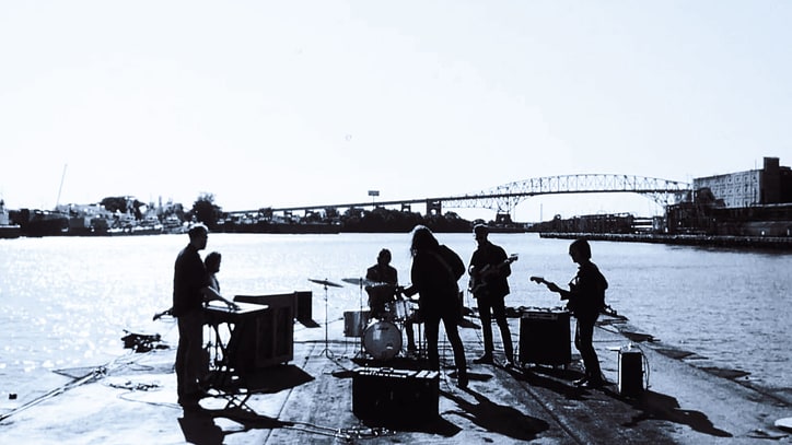 Watch the War on Drugs Perform on Philly River in 'Pain' Video