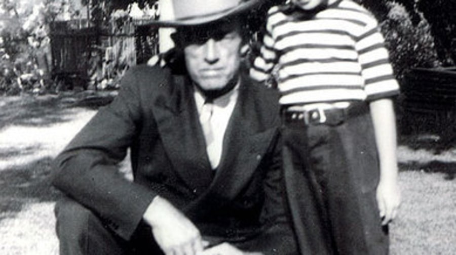 Merle photographed in 1944 with his father and his dog, Jack
