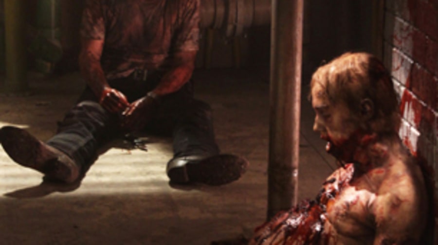Rick stabs the distended-belly zombie