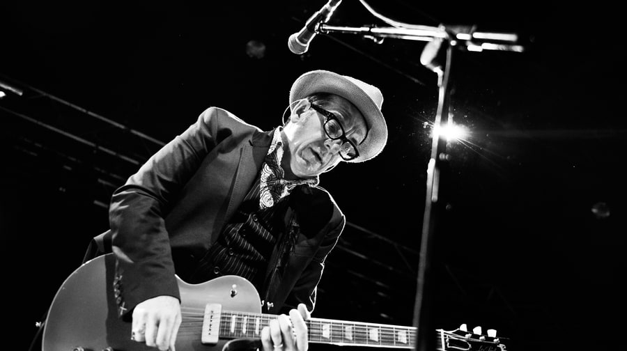 Elvis Costello and the Roots, “Walk Us Uptown”