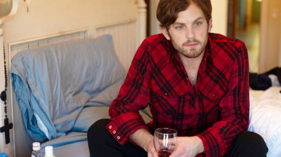 Caleb Followill Drinking Wine in Bed