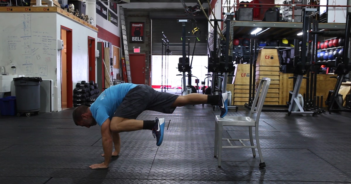 Elevated Mountain Climbers 8 Exercises You Can Do With Just a Chair